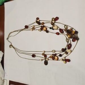 4 strand necklace with brown beads